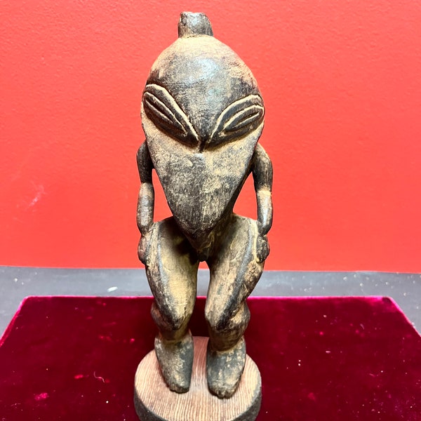 Stunning 10 inch antique Papua New Guinea wooden statue on contemporary base — magnificent patina