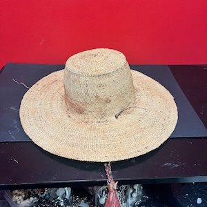 A  Stunning antique 17 inch long (8 inch long inside ) traditional indigenous, first nations, Canadian whaling hat — intense history
