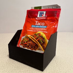 spices and seasoning pantry organizer/ holds around eight bags.