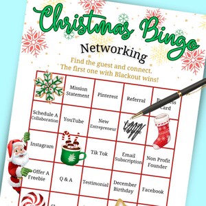 May include: A Christmas Bingo game sheet with a festive design. The sheet features a grid with networking-related terms like "YouTube" and "Instagram." The words "Christmas Bingo" and "Networking" are prominently displayed. A pen is poised over the "Visit My Website" square.