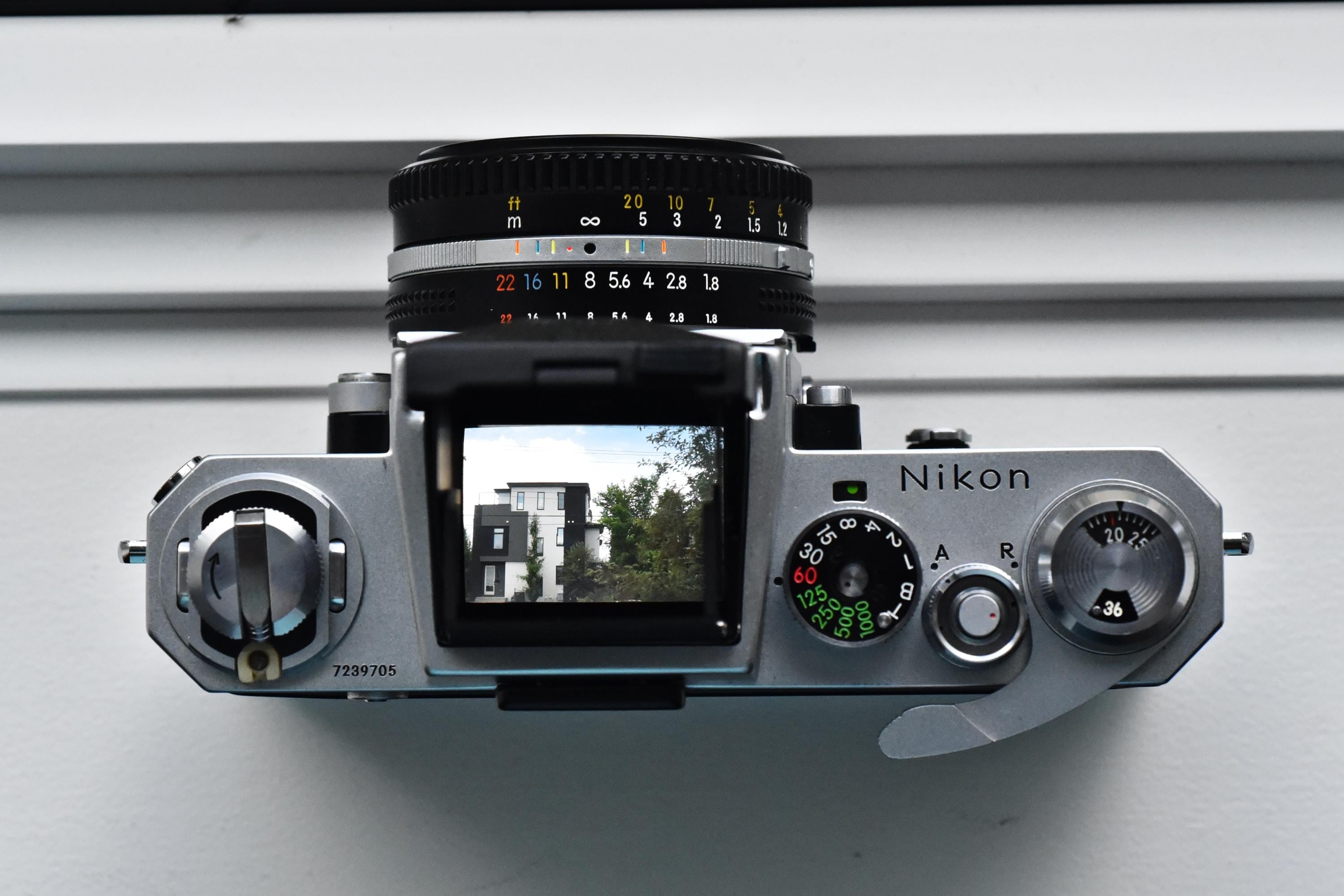 Nikon F vintage film camera with Nikon Waist level finder and 50mm F1.8 AIS lens. Tested, working! Excellent condition!