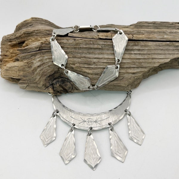 A set with a Sami traditional craft pewter necklace and a bracelet Jokkmokks Tin Sweden, 1970s.