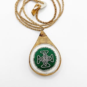 Sámi Duodji pendant– handcrafted masur birch and reindeer antler necklace with pewter embroidery.