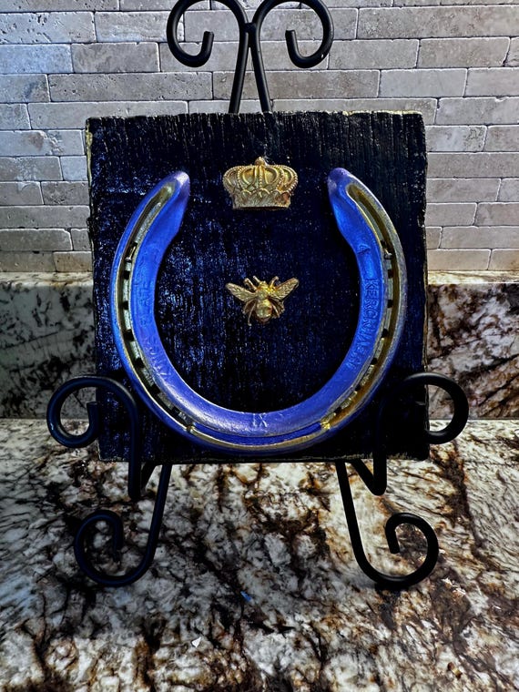 Equestrian designed home decor with horse shoes from Churchill Downs and wood from a KY Horse Farm. Hand Crafted in KY and all one of a kind