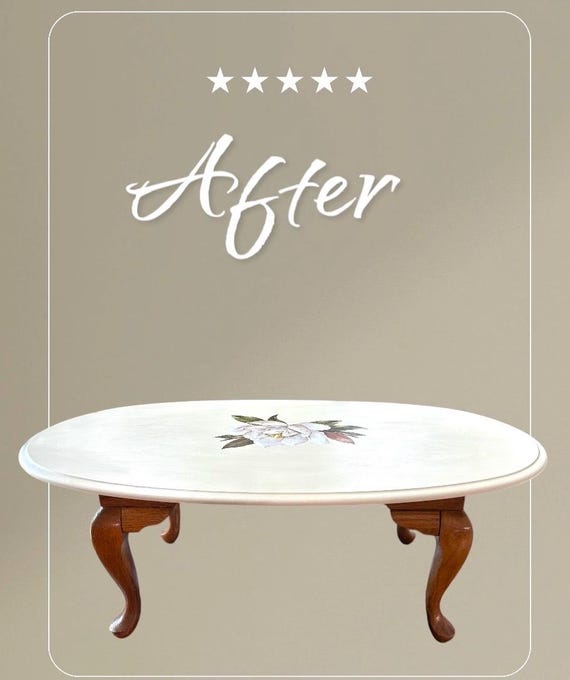 Broyhill solid oak coffee table with Magnolia Motif.