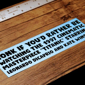 Honk if You'd Rather be Watching the 1997 Cinematic Masterpiece 'Titanic' starring Leonardo DiCaprio & Kate Winslet - Vinyl Bumper Sticker