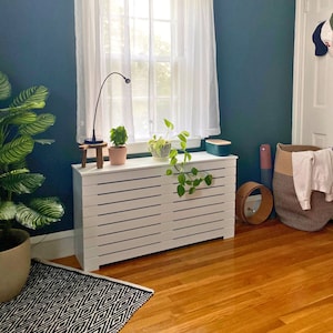 Are wooden radiator covers a good idea? Is it safe to put wood over a radiator? Can you use wood for a radiator cover? Is MDF safe for radiator cover? What wood is best for radiator covers?