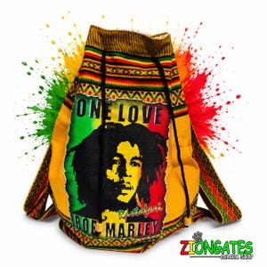 May include: A yellow drawstring backpack featuring a graphic of Bob Marley with the text One Love and Rastafari. The bag has a woven pattern in red, yellow, green, and black along the top and sides, with black rope straps and wooden beads.