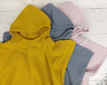 Entdecken Sie unsere vielseitigen Musselin Badeponchos für Babys und Kinder - praktisch und stilvoll - locker, luftig und leicht  | Ginalie