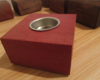 Single wooden tea light holder made from reclaimed wood.