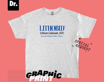Camiseta gris ceniza con cápsulas de carbonato de litio Lithobid