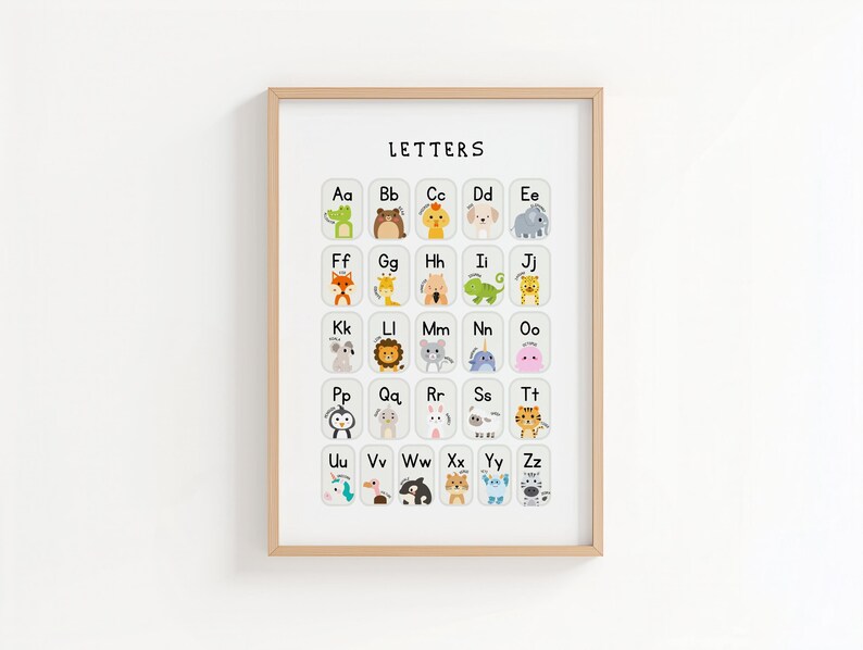 May include: A framed alphabet chart with the word "LETTERS" at the top. Each letter is paired with a cute animal illustration. The animals include a crocodile, bear, dog, elephant, fox, giraffe, lion, and more. The frame is a light brown color.