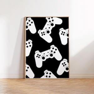 May include: A framed print with a repeating pattern of white video game controllers on a black background. The controllers are in a modern, minimalist style. The artwork is displayed in a wooden frame.