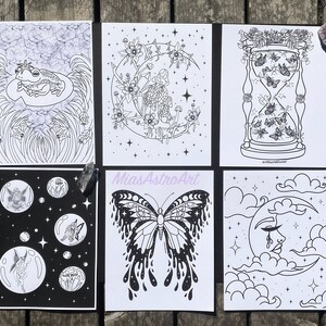 May include: Set of six black and white printable coloring pages featuring whimsical illustrations of a frog, a butterfly, a moon, an hourglass, and fairies. The illustrations are perfect for adults and children who enjoy coloring.