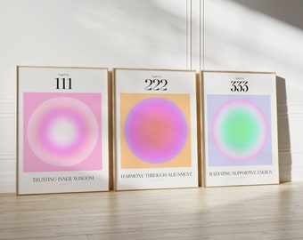May include: Three framed art prints with gradient orb designs in pink, orange, and blue hues. Each print features a number: 111, 222, and 333, with corresponding text: "Trusting Inner Wisdom," "Harmony Through Alignment," and "Radiating Supportive Energy."