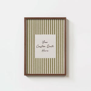 May include: A rectangular wall art piece in a dark brown wooden frame featuring a vertical striped pattern in olive green and off-white. Centered is a light beige square with jagged edges containing the black cursive text Your Custom Quote Here.