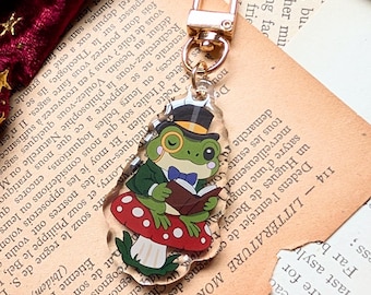 Grenouille lisant sur un porte-clés champignon // cadeau pour les amoureux des livres.
