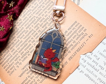Porte-clés dragon lecture confortable, fenêtre de coin livre//cadeau pour les amoureux des livres.