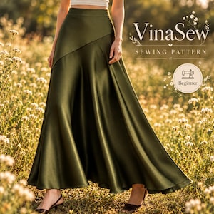 May include: A floor-length olive green satin skirt with a high waist and a diagonal seam across the hip. The text VinaSew SEWING PATTERN is visible in the upper right corner, along with a circular icon containing a sewing machine and the word Beginner.