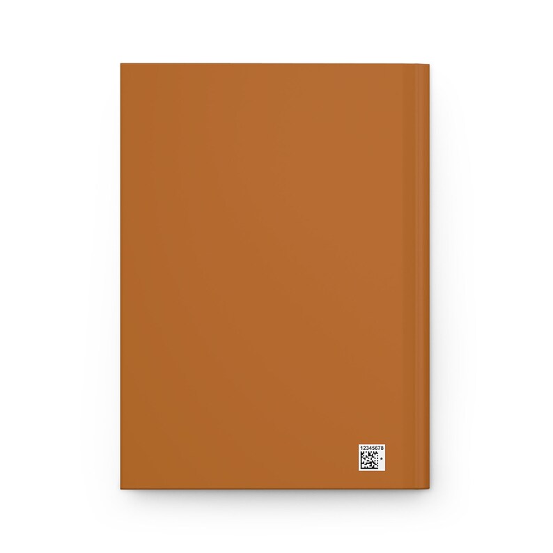 K&ouml;nnte beinhalten: Ein braunes Hardcover-Buch mit einem Barcode auf dem hinteren Umschlag.