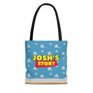 May include: A blue tote bag with a white cloud pattern and the text "Josh's Story" in yellow and red letters.
