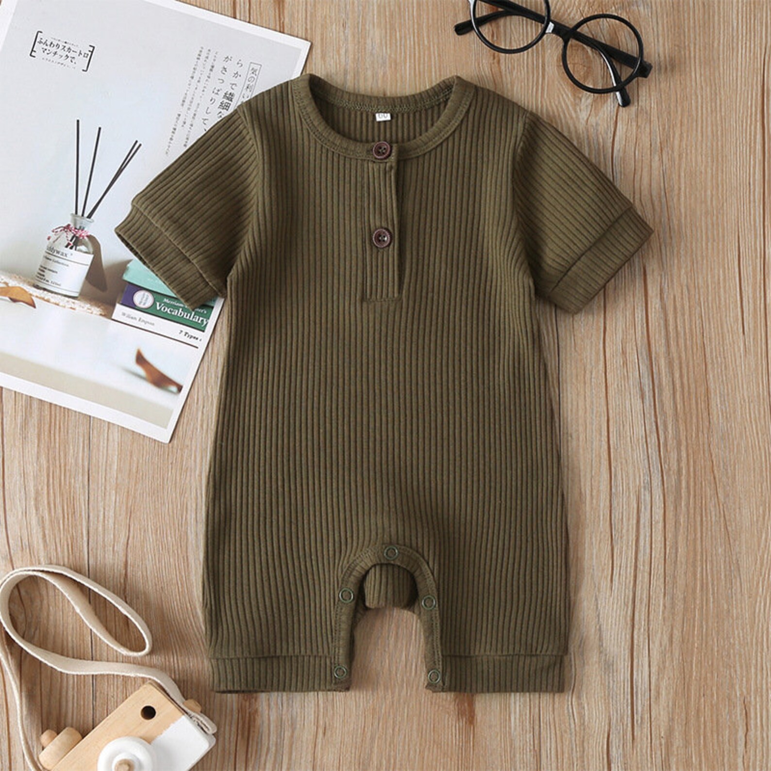 white button up onesie