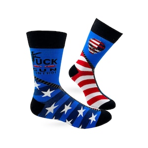 May include: Two pairs of socks with patriotic designs. One pair is blue with white stars and the text "FUCK GUN CONTROL". The other sock has red and white stripes with a skull and flag design. Both socks have black cuffs.