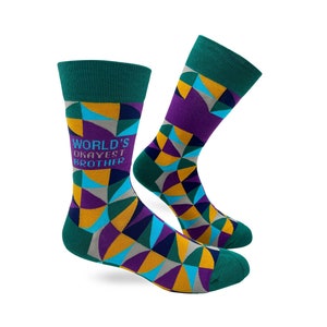 May include: A pair of colorful socks with a geometric pattern in shades of purple, blue, yellow, and green. The socks have the text "WORLD'S OKAYEST BROTHER" on one sock.
