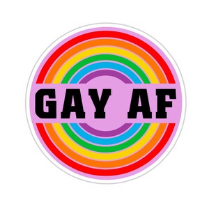 May include: A round sticker with a rainbow design and the text "GAY AF" in black letters.