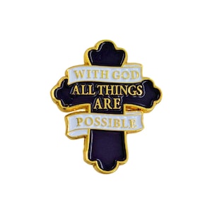 May include: A gold-edged, black cross-shaped pin with the words "WITH GOD ALL THINGS ARE POSSIBLE" in white lettering on a white banner. The pin has a glossy finish and is likely made of metal.