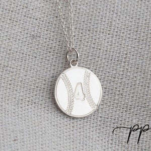 May include: Silver necklace with a baseball charm featuring the number 4.