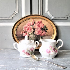 Antique sugar and cream set white 1900 white porcelain floral pattern small sugar and cream set.