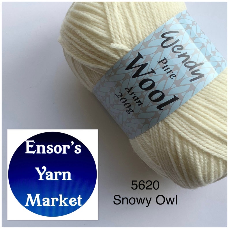 May include: A ball of white Wendy Pure Wool Aran yarn, labelled "5620 Snowy Owl" and "Wendy Pure Wool Aran 200g".