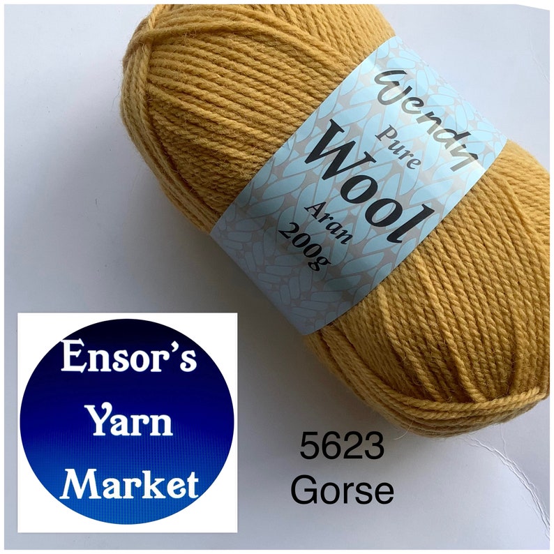 May include: A ball of yellow Aran weight yarn labelled "Wendy Pure Wool Aran 200g" and "5623 Gorse". The yarn is from Ensor's Yarn Market.