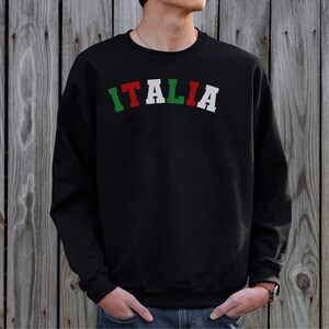 Italia Shirt with red green and white letters on a black sweatshirt