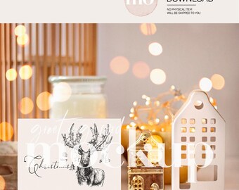May include: A white card with a black and white illustration of a deer with antlers decorated with Christmas lights. The text "greet the world with a merry Christmas" is written on the card.