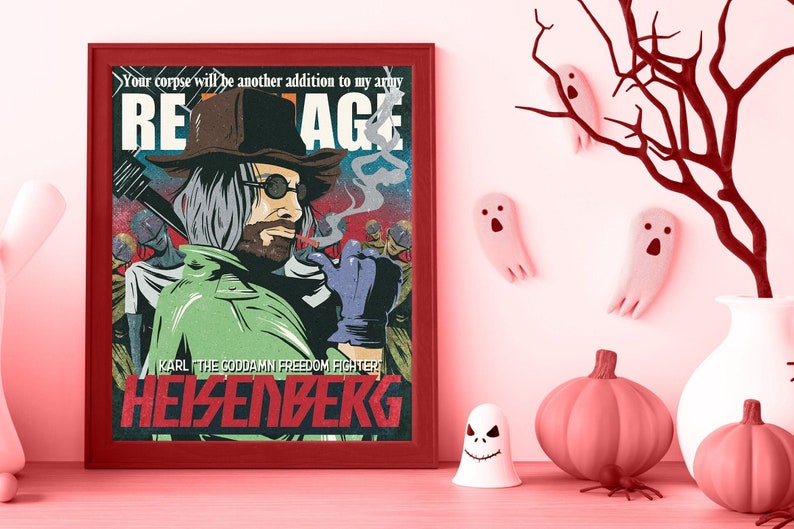 May include: A framed print with a red border features a stylized illustration of a man with a beard, sunglasses, and a hat, smoking a cigarette. The text reads "REAGE" and "HEISENBERG". Halloween decorations, including pumpkins and ghosts, are in the foreground.