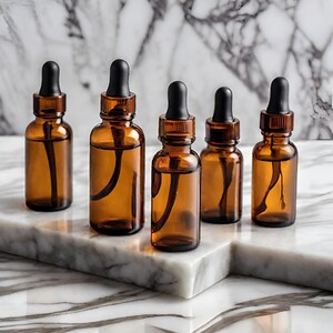 a group of brown glass bottles sitting on top of a marble counter