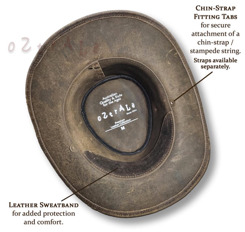 Puede incluir: Sombrero de cuero marr&oacute;n desgastado con una banda de sudoraci&oacute;n de cuero y pesta&ntilde;as de ajuste para la barbilla. El sombrero tiene el texto "o2traLa" y "Australian Quality & Style for the Ages" en el interior. Talla M.