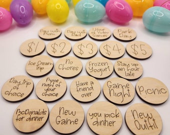 May include: Wooden circles with different activities written on them, such as "Ice Cream Trip", "No Chores", "Frozen Yogurt", "Stay up an hour late", "Game Night", "Picnic", "Day Trip of Choice", "Movie Night of Your Choice", "Have a Friend Over", "New Game", "You Pick Dinner", "New Outfit", "McDonalds for Dinner", and dollar amounts from $1 to $5.
