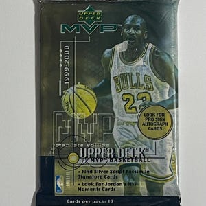 May include: Sealed Upper Deck MVP basketball card pack featuring Michael Jordan in a Bulls jersey. The pack has a green and gold color scheme with the text "MVP" and "1999-2000". It also mentions "Pro Sign Autograph Cards".