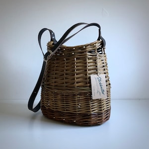 Leather strap shoulder basket