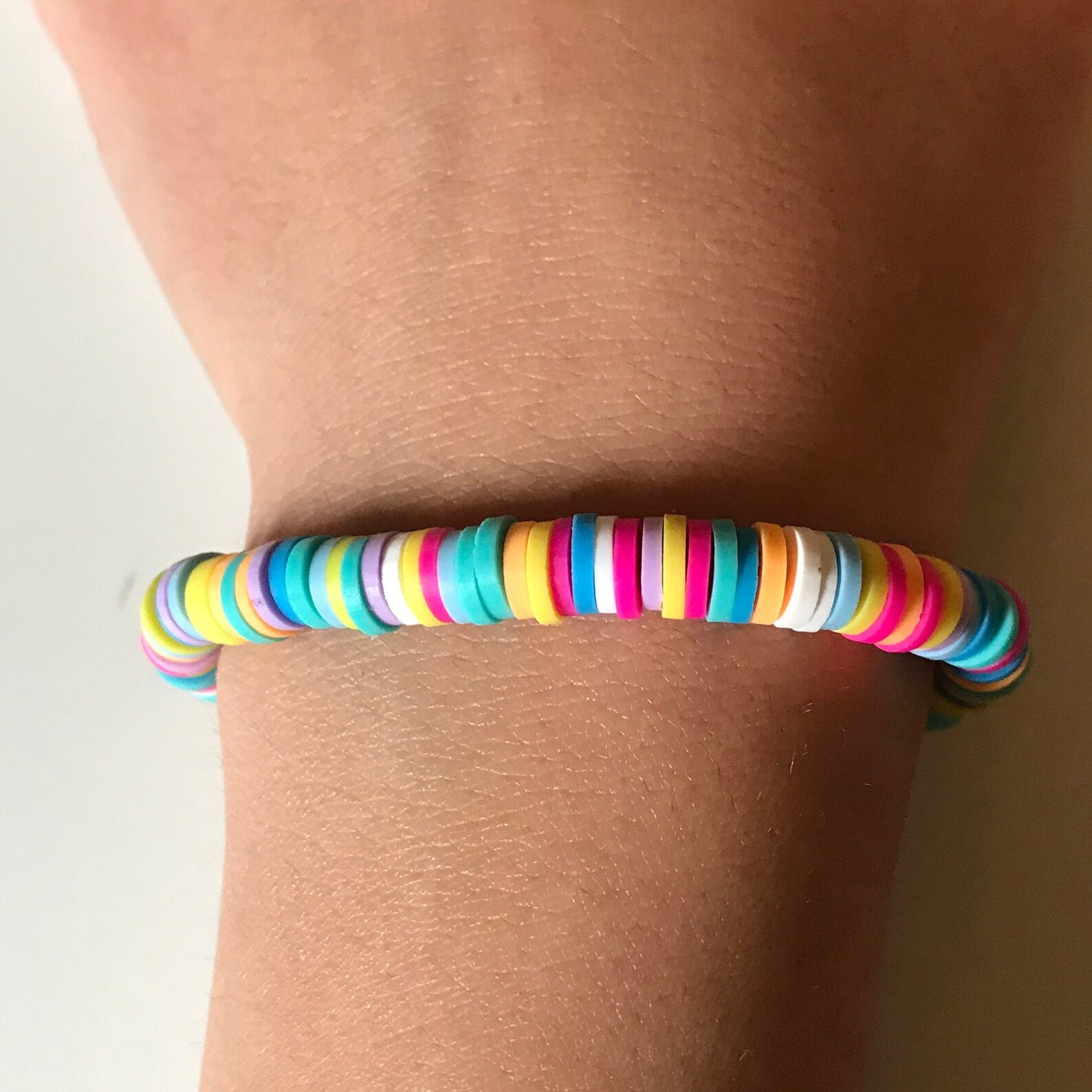Rainbow disc bead bracelet Etsy