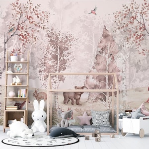 Peel and stick forest wallpaper mural with charming animals like a fox, squirrel, and birds set among soft brown and pink trees.