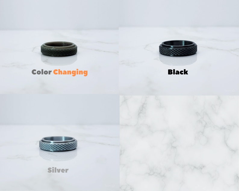 May include: Three silicone rings in different colors: color changing, black, and silver. The rings are textured and have a grooved design.