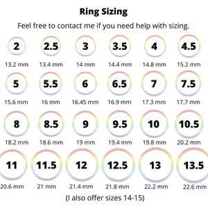 May include: A chart showing ring sizes from 2 to 13.5, with corresponding measurements in millimeters. The chart also includes the text "Ring Sizing" and "Feel free to contact me if you need help with sizing."  The chart is on a white background with rainbow-colored circles.