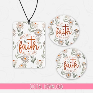 May include: A set of two car air fresheners and a rearview mirror charm with a floral design and the text "Walk by faith, not by sight".