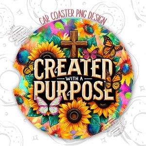 May include: A round car coaster with a watercolor background featuring sunflowers, butterflies, and a wooden cross. The text "Created with a Purpose" is written in a rustic font.