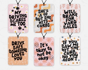 May include: Six colorful car air freshener designs with different humorous sayings. The designs feature a variety of patterns and colors, including pink, orange, yellow, and white.