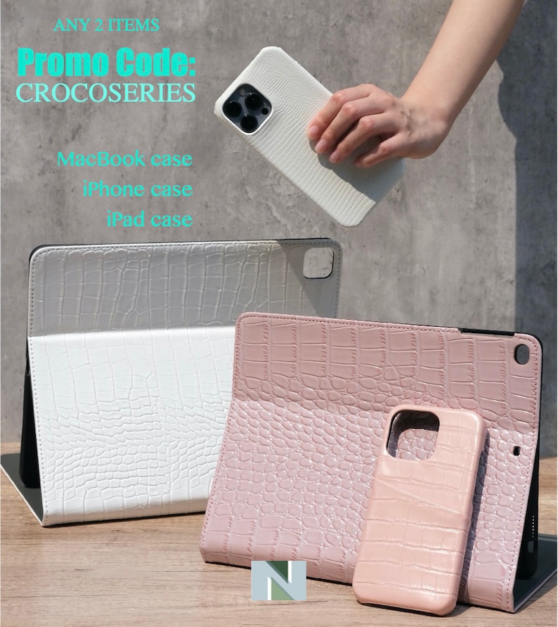 May include: Three phone cases with a crocodile pattern. The cases are in white, pink, and light pink. The white case is for a tablet, the pink case is for a phone, and the light pink case is for a phone. The text "Promo Code: CROCOSERIES" is at the top of the image. The text "MacBook case, iPhone case, iPad case" is below the cases.